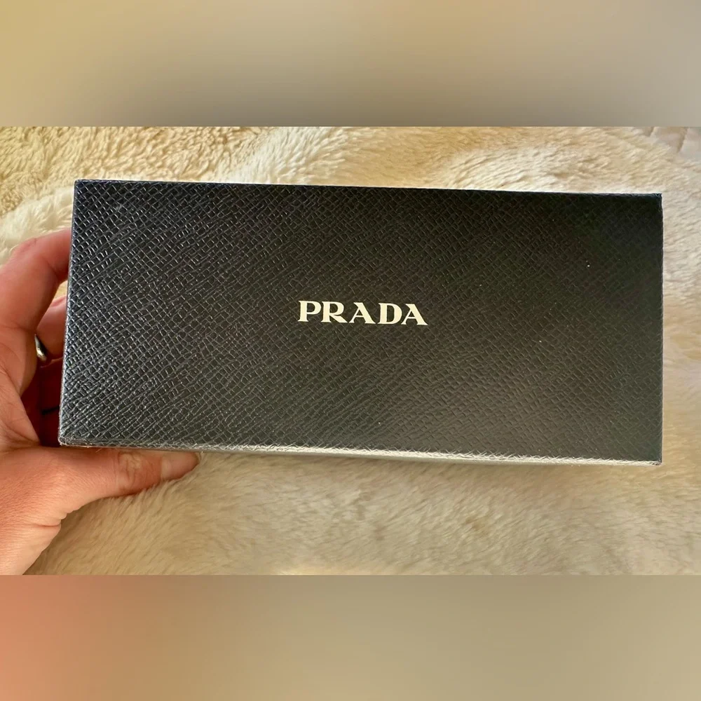 Prada White Frame Sunglasses with Dark Lenses